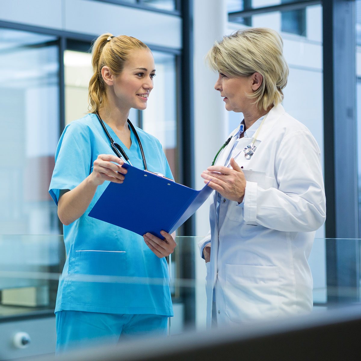 Doctor talking with nurse