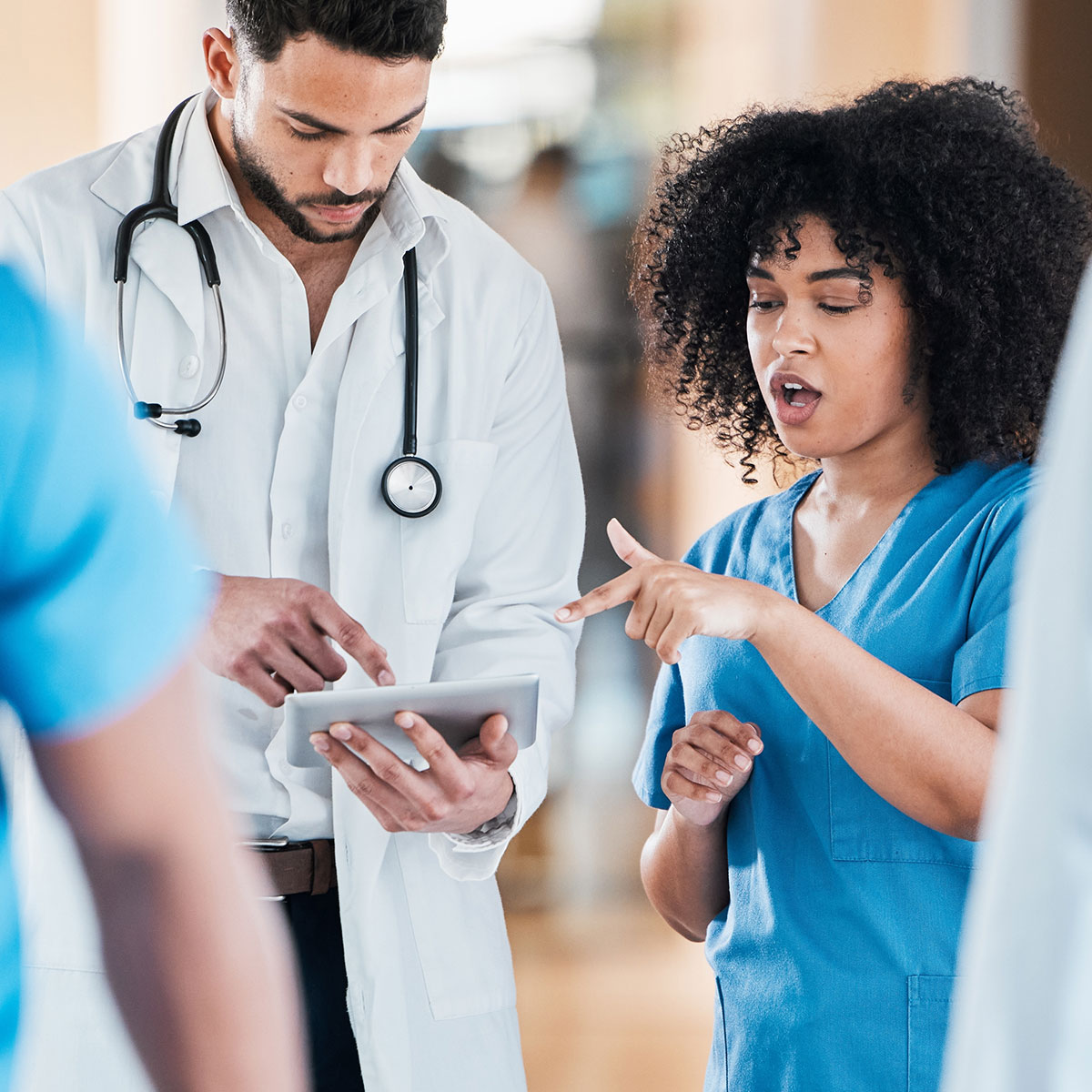 Doctor talking with nurse