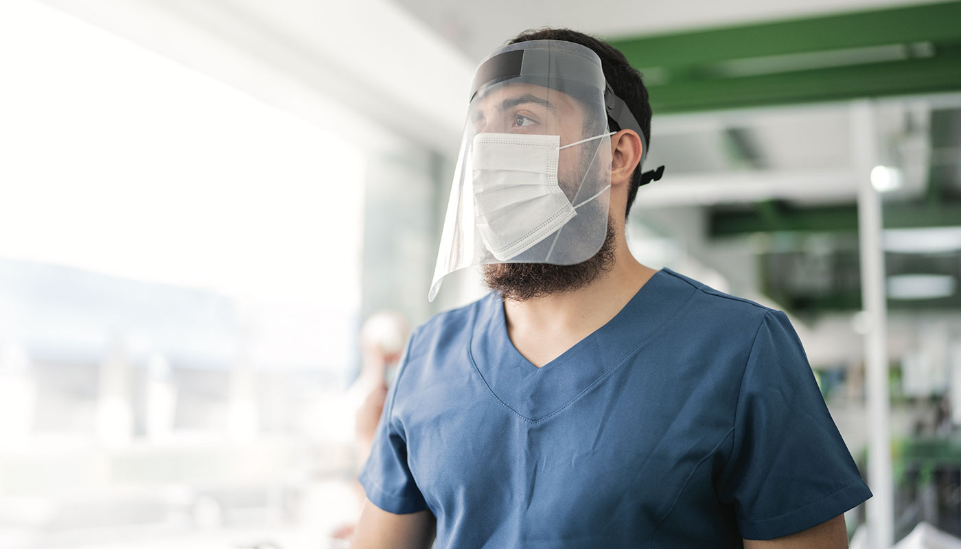 Nurse wearing face shield